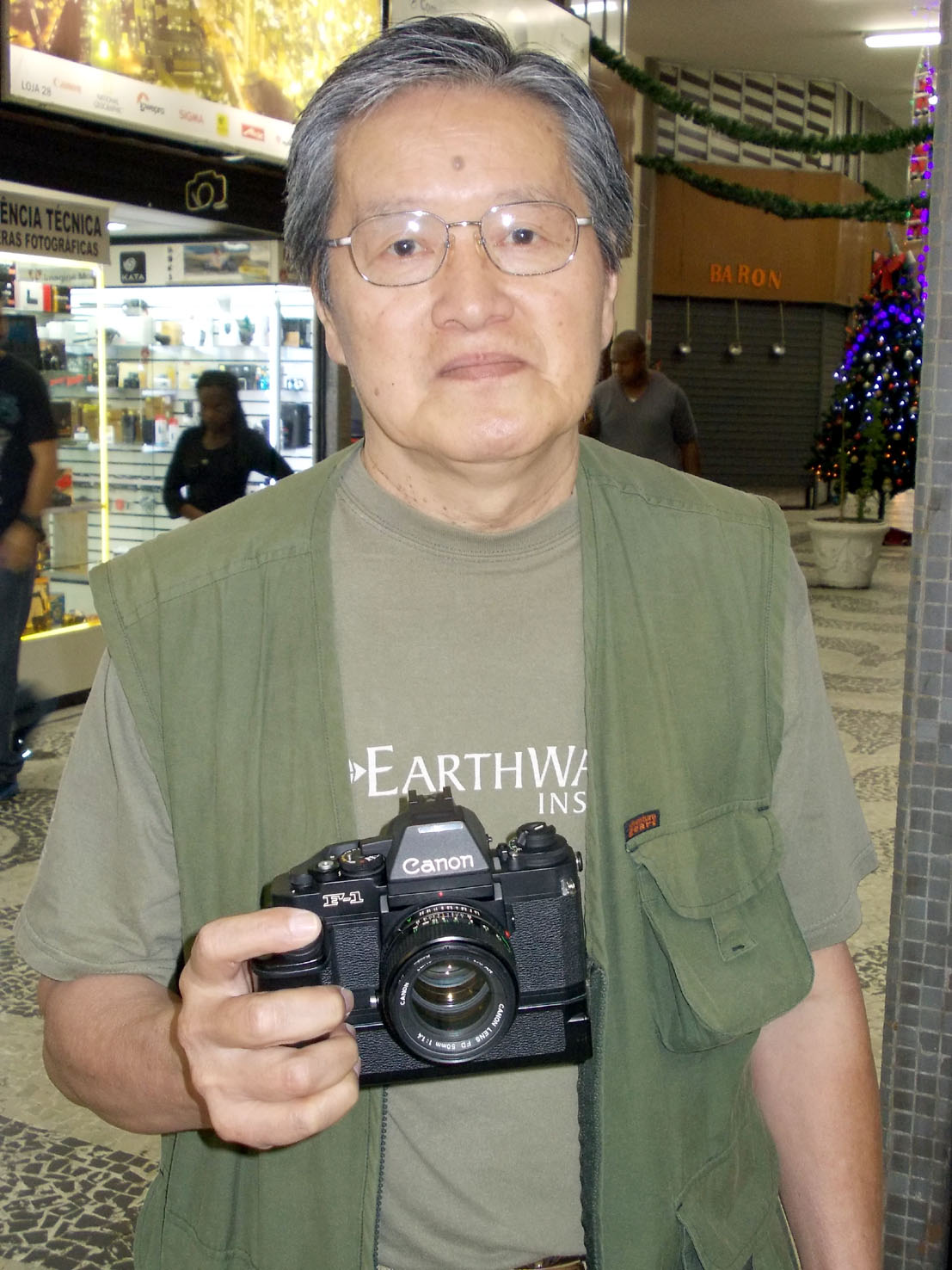 Hirooka was with his Canon F1 with winder and 50 mm f/1.4 lens. He is 